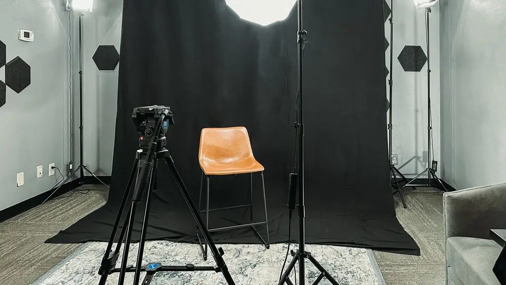Media Studio black backdrop with camera and lighting for video production in San Antonio