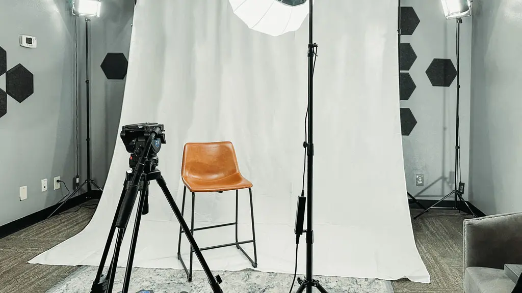 Media Studio white backdrop with camera and lighting for video production in San Antonio